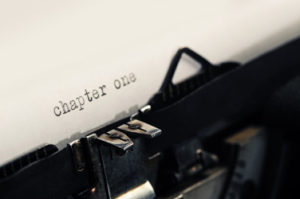 typewriter closeup: on page is typed 'chapter one' | What Happens On Page One; 30 WAYS TO START A NOVEL #opening scene examples #starting a novel #first chapter examples #how not to start a story #best ways to start a novel #how to begin writing a novel