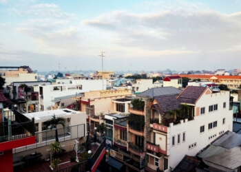 Image of rooftops in an urban neighborhood.