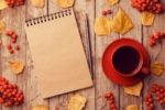 fall leaves, coffee, blank note pad