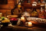 medieval ingredients, including beans, vinegar, and oil, with candles