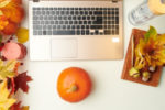 computer keyboard, pumpkin, journal, fall leaves