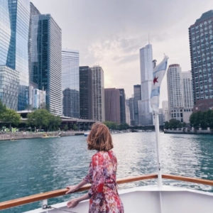 Bryn Donovan looking at skyscrapers from a boat