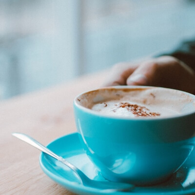 latte mug and hand