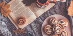 book, cinnamon rolls, fall leaves