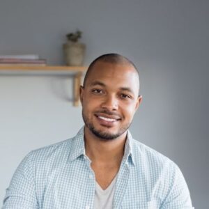 handsome Black man smiling at you