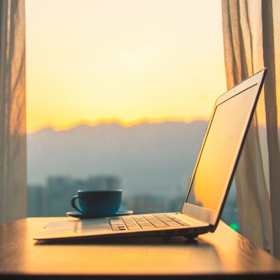 laptop, coffee cup, morning light