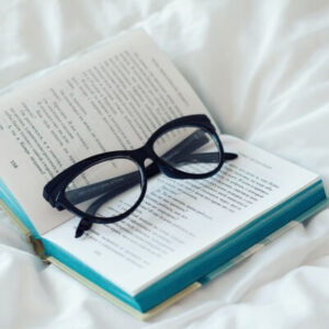 open book with reading glasses