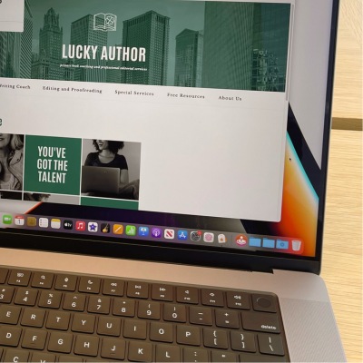 computer displaying the Lucky Author website