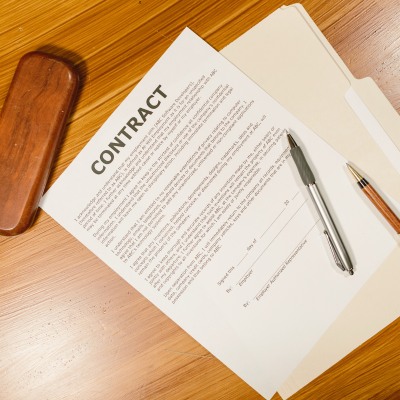 publishing contract and pen