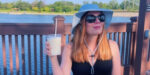 Bryn Donovan with virgin Pina colada by the lake, thinking about her summer bucket list