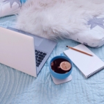 laptop, tea, notepad, pencil, on bed