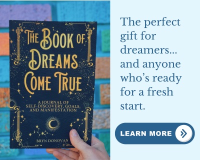 THE BOOK OF DREAMS COME TRUE: A Journal for Manifestation and Self-Discovery text: The perfect gift for dreamers...and anyone who's ready for a fresh start. (button) Learn More